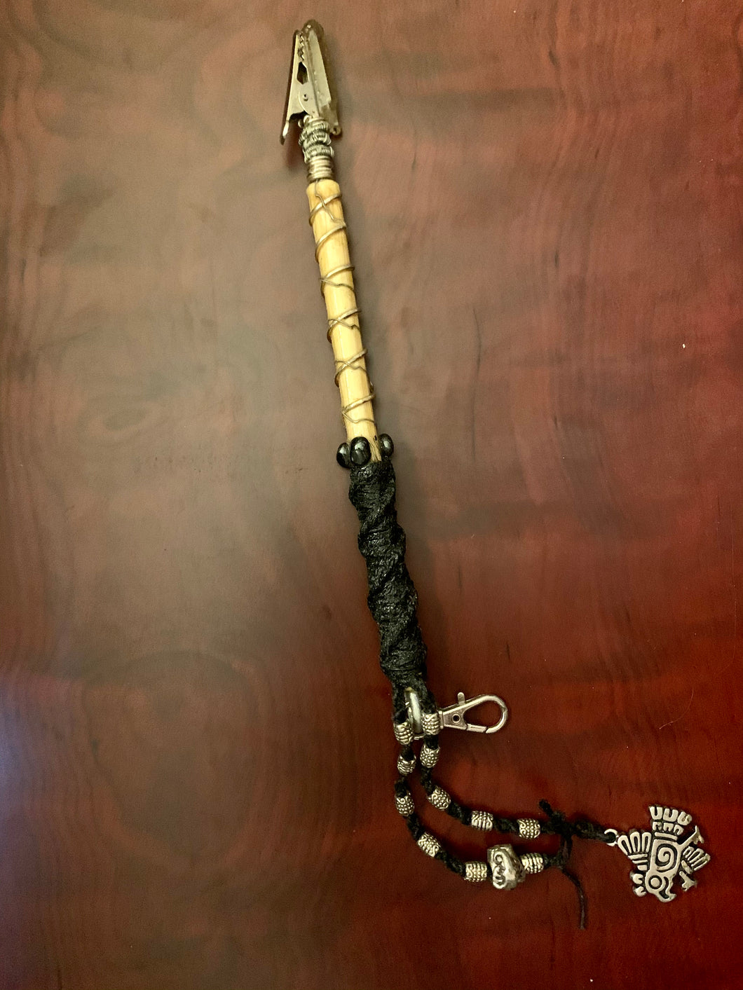 Black handle wrapped doobie stick with quartz and Aztec eagle